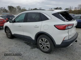 2021 Ford Escape SEL with VIN 1FMCU9H9XMUA23479, listed as a Copart auction lot 77737584 with 54,705 mi miles and Salvage Title. Bid and sale history available at DreamBid. Image 2.