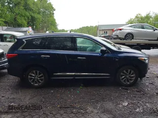 2015 Infiniti QX60 with VIN 5N1AL0MM5FC535725, listed as a IAAI auction lot 42240578 with 100,356 mi miles and . Bid and sale history available at DreamBid. Image 13.