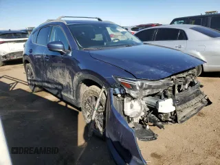 2018 Mazda CX-5 Grand Touring with VIN JM3KFBDM9J0323388, listed as a Copart auction lot 47628135 with 102,098 mi miles and Salvage Title. Bid and sale history available at carsss.com. Image 4.