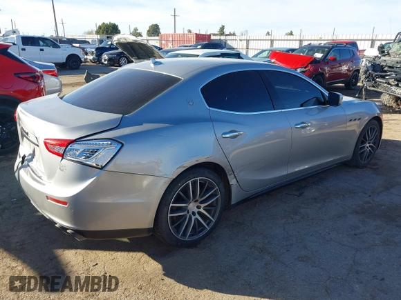 2015 Maserati Ghibli z VIN ZAM57XSA7F1135961, wystawiony jako IAAI lot #40831583 z przebiegiem 89 671 mil mil oraz . Historia ofert i sprzedaży dostępna na DreamBid. Obrazek 4.