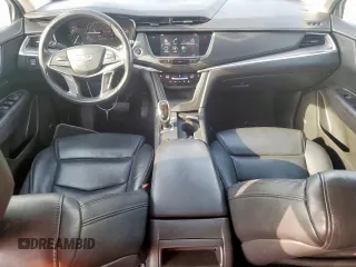 2018 Cadillac XT5 Luxury FWD with VIN 1GYKNCRS2JZ208016, listed as a Copart auction lot 61551285 with 145,019 mi miles and Salvage title. Bid and sale history available at DreamBid. Image 8.