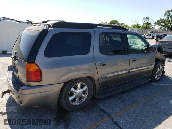 2005 GMC Envoy SLT z VIN 1GKET16M356134877, wystawiony jako Copart lot #57333345 z przebiegiem 205 714 mil mil oraz Szkoda całkowita • Salvage title. Historia ofert i sprzedaży dostępna na DreamBid. Obrazek 3.