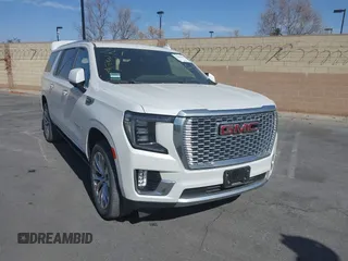 2022 GMC Yukon XL Denali with VIN 1GKS2JKL1NR217354, listed as a IAAI auction lot 41406548 with 29,940 mi miles and . Bid and sale history available at carsss.com. Image 1.