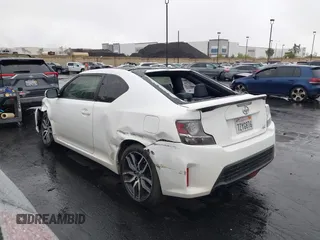 2014 Scion tC z VIN JTKJF5C77E3080128, wystawiony jako IAAI lot #42174898 z przebiegiem Nie podano mil oraz . Historia ofert i sprzedaży dostępna na DreamBid. Obrazek 14.