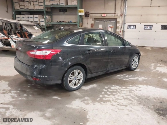 2012 Ford Focus SEL with VIN 1FAHP3H26CL344480, listed as a IAAI auction lot 41882368 with 162,897 mi miles. Bid and sale history available at carsss.com. Image 4.
