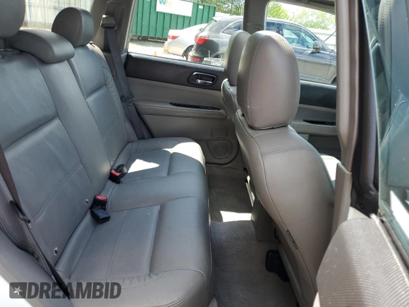 2003 Subaru Forester XS with VIN JF1SG65663H729152, listed as a Copart auction lot 58026535 with 174,141 mi miles and Salvage title. Bid and sale history available at DreamBid. Image 11.