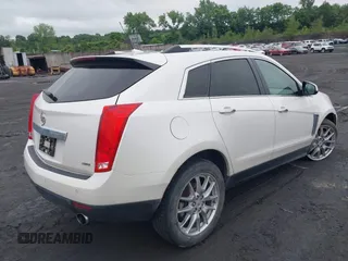 2013 Cadillac SRX Performance Collection with VIN 3GYFNHE34DS628486, listed as a IAAI auction lot 42530124 with 76,778 mi miles and . Bid and sale history available at DreamBid. Image 4.