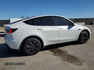 2024 Tesla Model Y with VIN 7SAYGDED3RF130826, listed as a Copart auction lot 47735185 with 10,467 mi miles and Non Repairable. Bid and sale history available at DreamBid. Image 3.