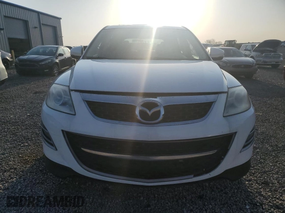2011 Mazda CX-9 Grand Touring z VIN JM3TB3DV2B0311423, wystawiony jako Copart lot #52713805 z przebiegiem 169 000 mil mil oraz Szkoda całkowita • Salvage title. Historia ofert i sprzedaży dostępna na DreamBid. Obrazek 5.