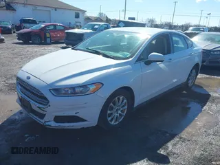 2015 Ford Fusion S with VIN 1FA6P0G79F5116338, listed as a IAAI auction lot 41755743 with 290,698 mi miles. Bid and sale history available at carsss.com. Image 2.