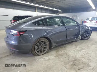 2021 Tesla Model 3 Long Range z VIN 5YJ3E1EB3MF848122, wystawiony jako Copart lot #56423005 z przebiegiem 57 619 mil mil oraz Szkoda całkowita • Salvage title. Historia ofert i sprzedaży dostępna na DreamBid. Obrazek 3.