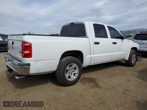 2005 Dodge Dakota SLT with VIN 1D7HE48N35S263600, listed as a Copart auction lot 46705555 with 128,519 mi miles and Salvage Title. Bid and sale history available at DreamBid. Image 3.