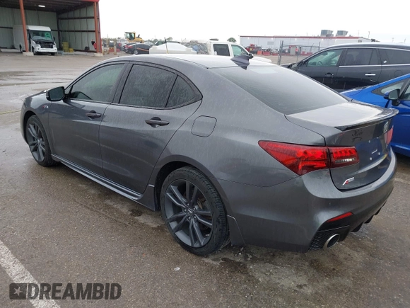 2019 Acura TLX w/A-Spec Pkg z VIN 19UUB2F61KA000932, wystawiony jako IAAI lot #42164064 z przebiegiem 79 080 mil mil oraz . Historia ofert i sprzedaży dostępna na DreamBid. Obrazek 3.