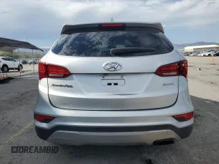 2017 Hyundai Santa Fe 2.4L z VIN 5XYZT3LB2HG392689, wystawiony jako Copart lot #59354795 z przebiegiem 54 525 mil mil oraz Szkoda całkowita • Salvage title. Historia ofert i sprzedaży dostępna na DreamBid. Obrazek 6.