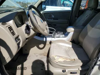 2007 Mercury Mariner Luxury with VIN 4M2YU91147KJ04454, listed as a Copart auction lot 49666005 with 198,627 mi miles and Salvage title. Bid and sale history available at DreamBid. Image 7.