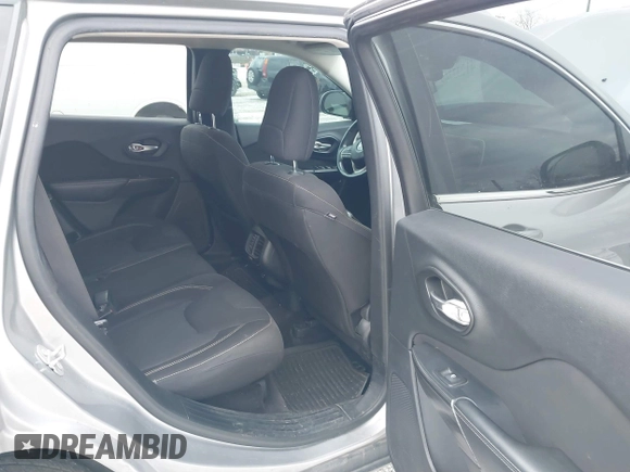 2016 Jeep Cherokee 75th Anniversary with VIN 1C4PJLCB1GW297555, listed as a IAAI auction lot 41232269 with 257,033 mi miles. Bid and sale history available at carsss.com. Image 8.