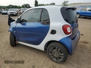 2016 Smart fortwo Passion z VIN WMEFJ5DA9GK062214, wystawiony jako Copart lot #61179715 z przebiegiem 58 152 mil mil oraz Czysty tytuł • Clean title. Historia ofert i sprzedaży dostępna na DreamBid. Obrazek 2.