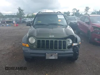 2006 Jeep Liberty Sport with VIN 1J4GL48K76W288408, listed as a IAAI auction lot 39990700 with 215,716 mi miles. Bid and sale history available at carsss.com. Image 12.