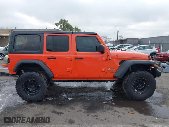 2019 Jeep Wrangler Unlimited Sport S with VIN 1C4HJXDG7KW568441, listed as a IAAI auction lot 41142271 with 73,698 mi miles and . Bid and sale history available at DreamBid. Image 14.