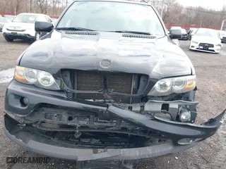 2006 BMW X5 4.4i with VIN 5UXFB53506LV22836, listed as a IAAI auction lot 41727708 with 186,084 mi miles. Bid and sale history available at carsss.com. Image 6.