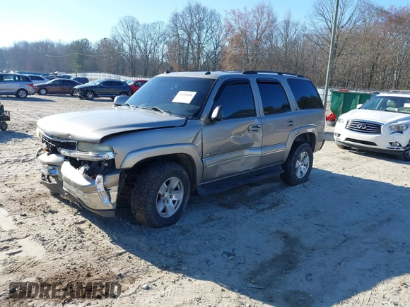 2003 Chevrolet Tahoe LS with VIN 1GNEK13Z03J294201, listed as a IAAI auction lot 41656836 with 302,922 mi miles. Bid and sale history available at carsss.com. Image 2.