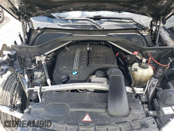 2016 BMW X5 xDrive35i z VIN 5UXKR0C52G0P26716, wystawiony jako Copart lot #56028275 z przebiegiem 128 355 mil mil oraz Szkoda całkowita • Salvage title. Historia ofert i sprzedaży dostępna na DreamBid. Obrazek 12.