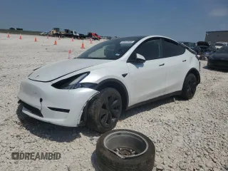 2023 Tesla Model Y Long Range z VIN 7SAYGDEE4PA064502, wystawiony jako Copart lot #53337645 z przebiegiem 16 945 mil mil oraz Szkoda całkowita • Salvage title. Historia ofert i sprzedaży dostępna na DreamBid. Obrazek 1.