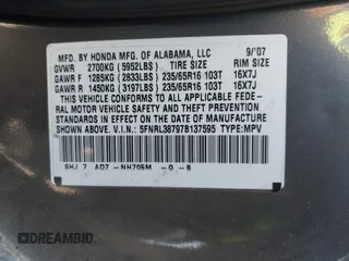 2007 Honda Odyssey EX-L z VIN 5FNRL38797B137595, wystawiony jako IAAI lot #42002233 z przebiegiem 192 296 mil mil oraz . Historia ofert i sprzedaży dostępna na DreamBid. Obrazek 9.