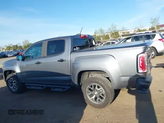 2021 GMC Canyon 4WD AT4 w/Leather with VIN 1GTG6FEN9M1123638, listed as a IAAI auction lot 41852163 with 77,442 mi miles. Bid and sale history available at carsss.com. Image 14.
