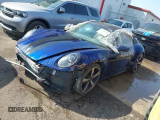 2022 Porsche 911 Carrera with VIN WP0CA2A96NS236957, listed as a IAAI auction lot 41154002 with 34,056 mi miles and . Bid and sale history available at DreamBid. Image 18.