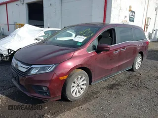 2018 Honda Odyssey EX-L with VIN 5FNRL6H73JB028770, listed as a IAAI auction lot 41984094 with 96,819 mi miles and . Bid and sale history available at DreamBid. Image 6.