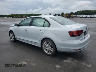 2017 Volkswagen Jetta SEL z VIN 3VWL17AJ6HM412147, wystawiony jako Copart lot #63333085 z przebiegiem Nie podano mil oraz Szkoda całkowita • Salvage title. Historia ofert i sprzedaży dostępna na DreamBid. Obrazek 2.