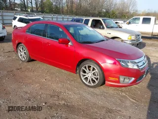 2011 Ford Fusion SE with VIN 3FAHP0HGXBR199597, listed as a IAAI auction lot 41950604 with 184,668 mi miles. Bid and sale history available at carsss.com. Image 1.