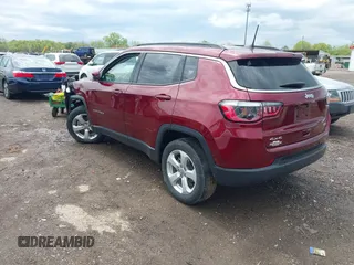 2021 Jeep Compass Latitude with VIN 3C4NJDBBXMT504993, listed as a IAAI auction lot 42181872 with 56,053 mi miles and . Bid and sale history available at DreamBid. Image 3.