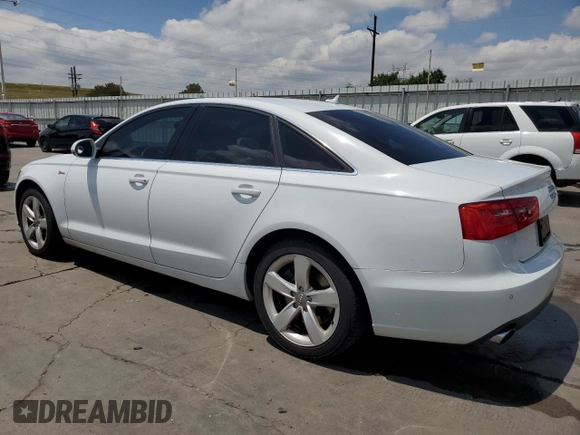 2012 Audi A6 Premium Plus with VIN WAUGGAFC5CN127963, listed as a Copart auction lot 63074335 with 140,979 mi miles and Salvage title. Bid and sale history available at DreamBid. Image 2.