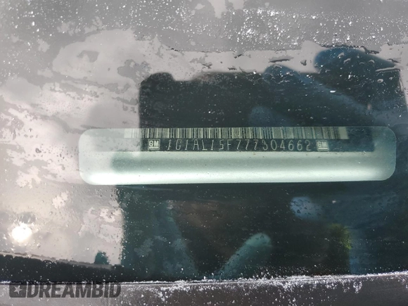 2007 Chevrolet Cobalt LT z VIN 1G1AL15F777304662, wystawiony jako Copart lot #51773995 z przebiegiem Nie podano mil oraz Szkoda całkowita • Salvage title. Historia ofert i sprzedaży dostępna na DreamBid. Obrazek 13.