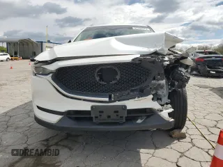 2017 Mazda CX-5 Sport with VIN JM3KFBBL8H0125972, listed as a Copart auction lot 52285975 with 123,853 mi miles and Salvage Title. Bid and sale history available at DreamBid. Image 5.