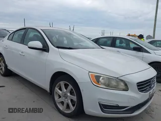 2015 Volvo S60 T5 Drive-E with VIN YV126MFJ8F2360316, listed as a IAAI auction lot 42829367 with 105,872 mi miles and . Bid and sale history available at DreamBid. Image 1.
