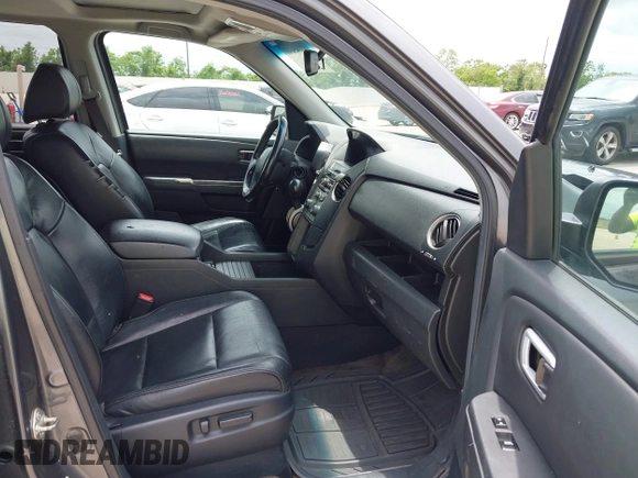 2013 Honda Pilot EX-L with VIN 5FNYF3H51DB002883, listed as a IAAI auction lot 42145649 with 223,901 mi miles. Bid and sale history available at carsss.com. Image 5.