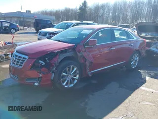 2014 Cadillac XTS Luxury z VIN 2G61N5S34E9163874, wystawiony jako IAAI lot #41649292 z przebiegiem 104 638 mil mil oraz . Historia ofert i sprzedaży dostępna na DreamBid. Obrazek 17.
