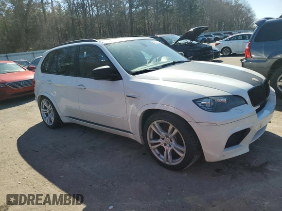 2012 BMW X5 M with VIN 5YMGY0C51CLK27397, listed as a Copart auction lot 48947555 with 0 mi miles and Salvage Title. Bid and sale history available at carsss.com. Image 4.