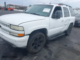 2003 Chevrolet Tahoe Z71 with VIN 1GNEK13Z03R240494, listed as a IAAI auction lot 42075566 with 203,398 mi miles. Bid and sale history available at carsss.com. Image 6.