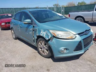 2012 Ford Focus SEL with VIN 1FAHP3M21CL363671, listed as a IAAI auction lot 42023896 with 164,727 mi miles. Bid and sale history available at carsss.com. Image 1.