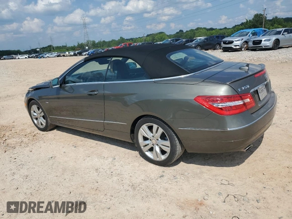 2012 Mercedes-Benz E 350 with VIN WDDKK5KF4CF148130, listed as a Copart auction lot 60140815 with 86,895 mi miles and Salvage title. Bid and sale history available at DreamBid. Image 2.