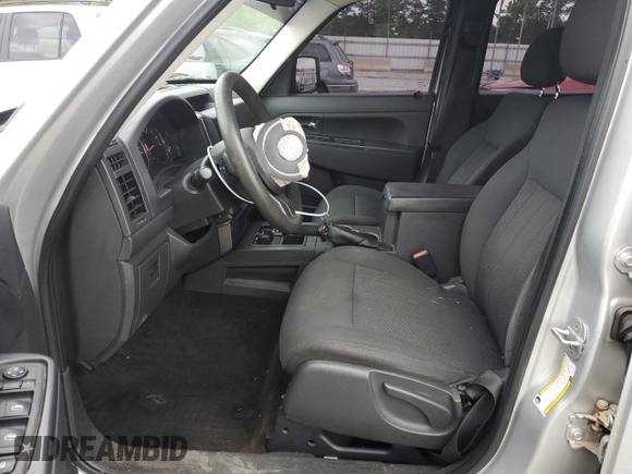2011 Jeep Liberty Sport with VIN 1J4PN2GK4BW543087, listed as a Copart auction lot 59131595 with 127,989 mi miles and Salvage title. Bid and sale history available at DreamBid. Image 7.