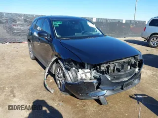 2019 Mazda CX-5 Grand Touring with VIN JM3KFBDM2K1685168, listed as a IAAI auction lot 41323598 with 88,429 mi miles. Bid and sale history available at carsss.com. Image 1.