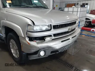 2005 Chevrolet Suburban Z71 with VIN 3GNFK16Z95G265896, listed as a IAAI auction lot 41248931 with 206,062 mi miles. Bid and sale history available at carsss.com. Image 6.