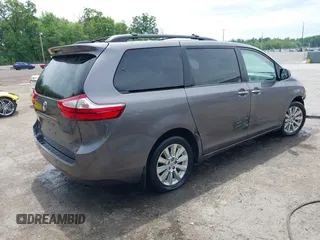 2015 Toyota Sienna Limited z VIN 5TDDK3DC6FS111675, wystawiony jako IAAI lot #42240747 z przebiegiem 124 967 mil mil oraz . Historia ofert i sprzedaży dostępna na DreamBid. Obrazek 4.