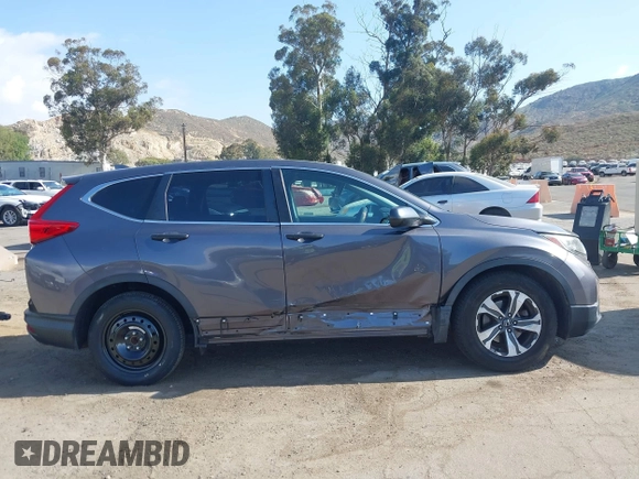 2019 Honda CR-V LX z VIN 2HKRW5H33KH401422, wystawiony jako IAAI lot #42116431 z przebiegiem 119 387 mil mil oraz . Historia ofert i sprzedaży dostępna na DreamBid. Obrazek 14.