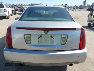 2005 Cadillac STS z VIN 1G6DW677350224198, wystawiony jako IAAI lot #42321639 z przebiegiem 122 208 mil mil oraz . Historia ofert i sprzedaży dostępna na DreamBid. Obrazek 16.